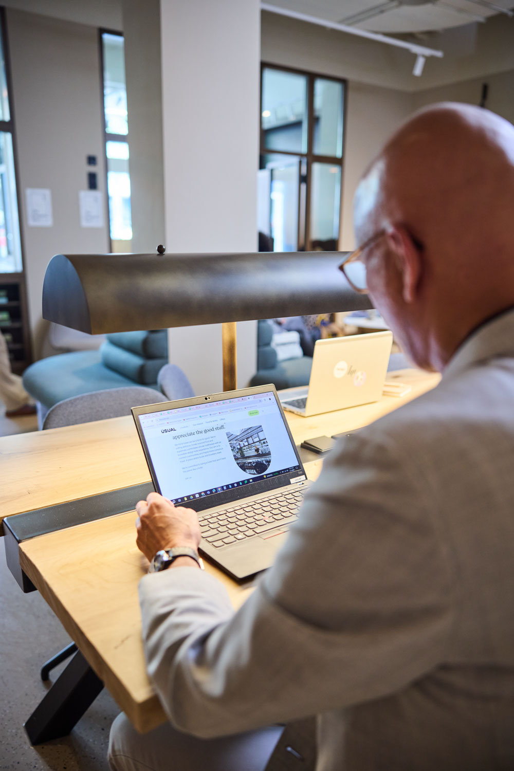 man working in coworking area