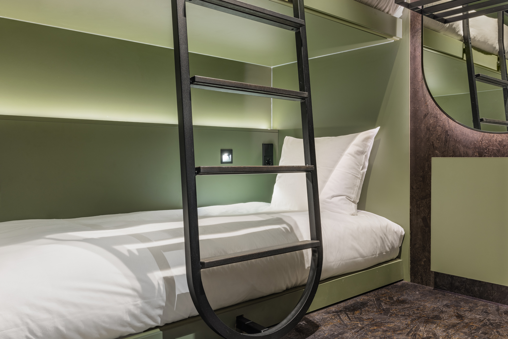 lower bunk of twin bunk pod