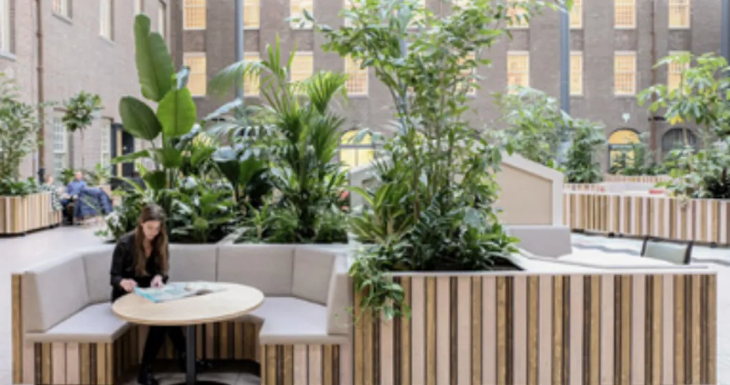 Indoor public space with seating and plants